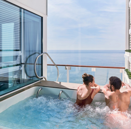couple in celebrity cruise ship pool