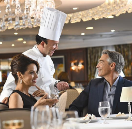 elderly couple dining on oceania cruises